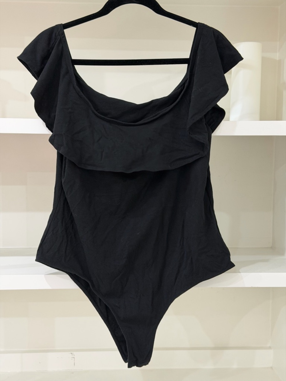 Ambiance Black Ruffle One-Piece Bodysuit